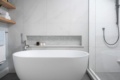 Esempio di una stanza da bagno padronale chic di medie dimensioni con mobile bagno freestanding