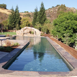 Free Form Pool with lap lane, slide and grotto. - Products