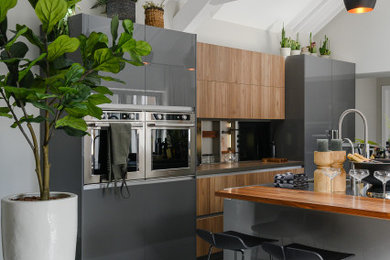 This is an example of a contemporary kitchen in London.