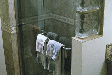 Inspiration for a contemporary beige tile bathroom remodel in Denver with white walls