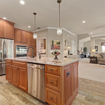 Kitchen Island rotated to face the family room, reduced to one level & enlarged.