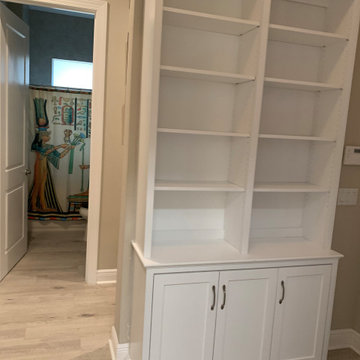 Custom Traditional Open Bookcases with Raised Panel Doors
