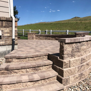 Back yard Renovation - Interlocking paver patio with built in step