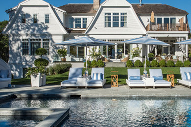 Example of a beach style pool design in New York