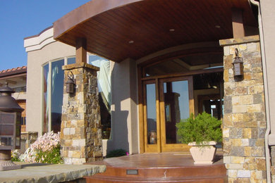 Tuscan entryway photo in Denver
