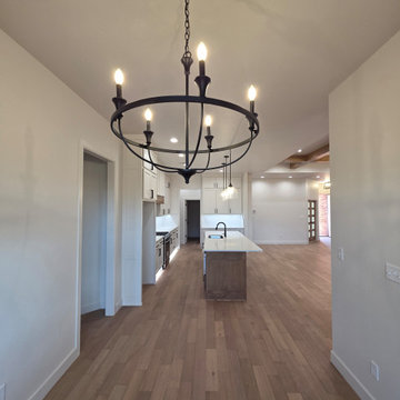 Separate dining area with chandelier for extra space