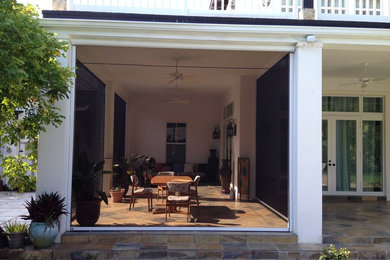 Patio - transitional patio idea in Miami