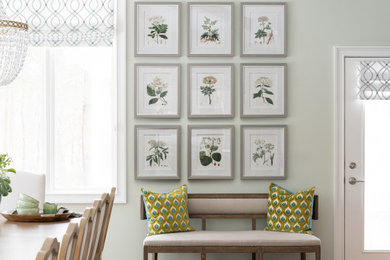 Inspiration for a timeless brown floor and exposed beam entryway remodel in Indianapolis with green walls