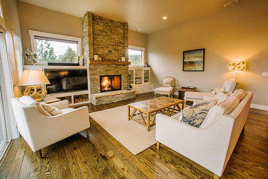 Living room - contemporary open concept dark wood floor living room idea in Other with gray walls, a standard fireplace, a stone fireplace and a media wall