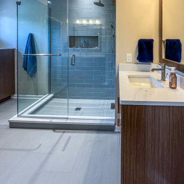 Contemporary Primary Bath with Rich Walnut Veneer Cabinets