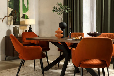 Design ideas for a medium sized contemporary enclosed dining room with beige walls, laminate floors and beige floors.