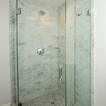 Tiled shower with frameless glass enclosure