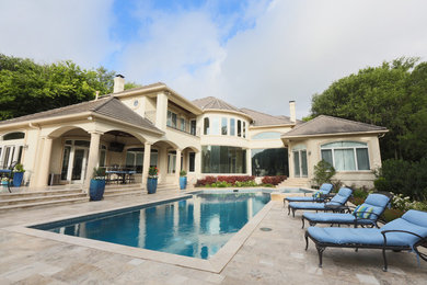 Inspiration for a large mediterranean backyard rectangular and tile lap hot tub remodel