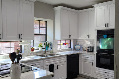 Kitchen - large traditional kitchen idea in Dallas with a drop-in sink and yellow backsplash