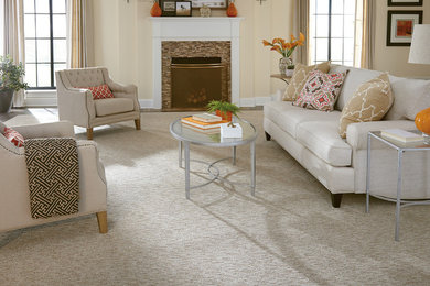 Mid-sized transitional formal and open concept carpeted living room photo in Wichita with beige walls, a standard fireplace, a tile fireplace and no tv