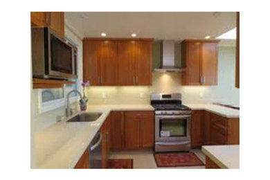 Kitchen photo in New York with stainless steel appliances