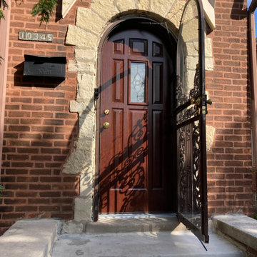 After / Round Top Woodgrain Steel Entry Door With Decorative Glass