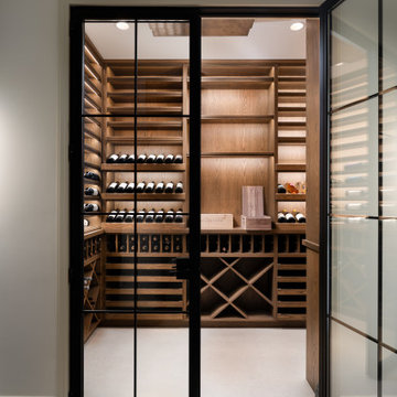 Modern Glass-Enclosed Wine Cellar with Custom Oak Racking | Chicago