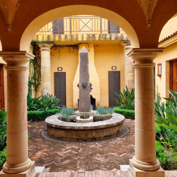 Hacienda Las Tapias - The Italian Courtyard seperates the Great Room from the Gu