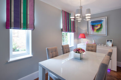 Design ideas for a contemporary dining room in West Midlands.