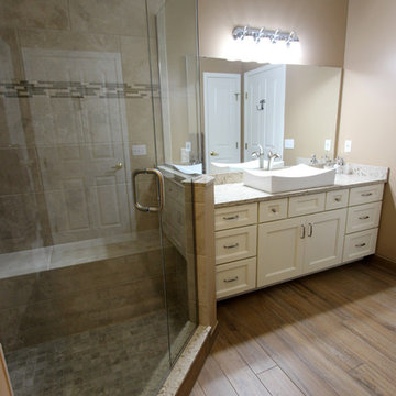 Master Bath Beige/Brown Porcelain Tiled Shower, White Vanity with Vessel Sink