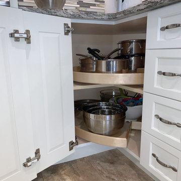 Super-sized lazy Susan corner cabinets with bi-folding doors