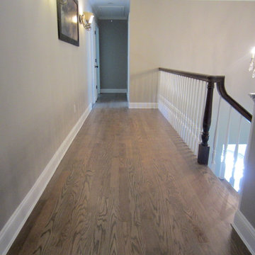 NISSEQUOGUE:  2 1/4" RED OAK W/ CUSTOM GREY BLEND STAIN + BONA TRAFFIC HD SATIN