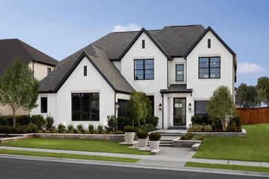 Example of a transitional exterior home design in Dallas