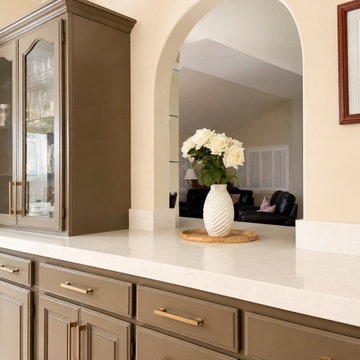White Quartz Kitchen with Navy Island and Plantation Shutters