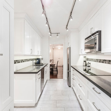 Condo White Galley Kitchen