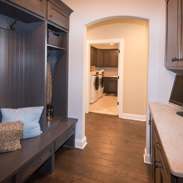 Mudroom with boot bench, lockers, walk-in coat closet and drop zone