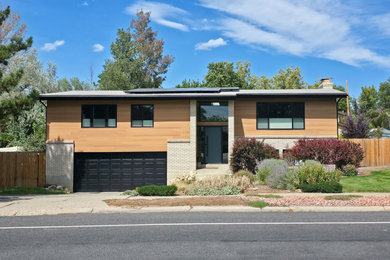 Inspiration for a mid-century modern exterior home remodel in Salt Lake City