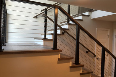 Inspiration for an industrial staircase remodel in Orange County