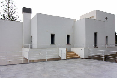 Photo of a modern home design in Catania-Palermo.