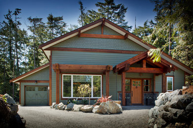 Transitional wood exterior home idea in Vancouver