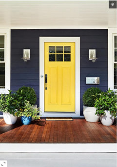 Yellow front door with BM Hale Navy house