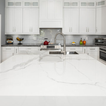 This kitchen leans contemporany, but the frame and crown keep it grounded in tra