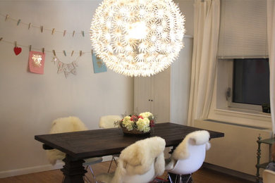 Example of an eclectic dining room design in New York