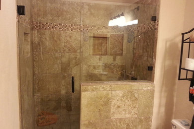 Example of an island style bathroom design in Austin