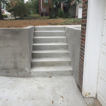 New Concrete Driveway Entrance, Retaining Walls, and New Iron Fence