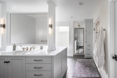 Example of a classic master gray floor and double-sink toilet room design in Detroit with gray cabinets, gray walls, yellow countertops and a built-in vanity