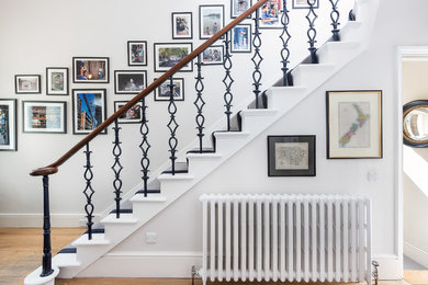 Mid-sized traditional straight staircase in London.