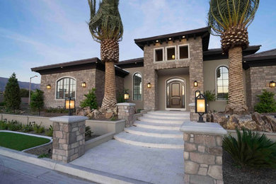 Example of a classic brown one-story mixed siding house exterior design in Las Vegas