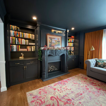 Monochromatic Fireside Elegance: A Radiant Transformation with Built-in Shelving