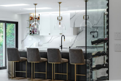 Example of a transitional home design design in Toronto