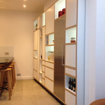 Formica Kitchen with flat fronted doors and stone tops