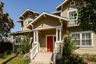 Inspiration for a mid-sized timeless two-story concrete fiberboard exterior home remodel in San Francisco with a shingle roof