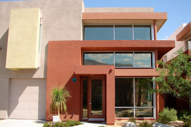 Inspiration for a mid-sized southwestern house exterior remodel in Los Angeles