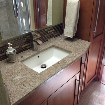 Omega Cabinetry. Plainfield door, Cherry wood, Nutmeg stain