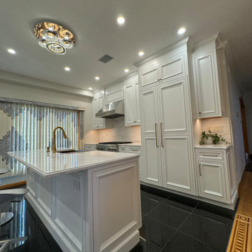 Rutt Kitchen - Galley Kitchen with White painted cabinetry